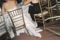 bride sitting at head table with her bridesmaids