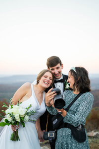 Eleanor Stenner with bride and groom at Birmingham wedding 