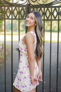 high school senior poses at park in redmond washington