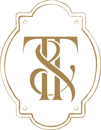 Submark logo of Ivory and Tweed in gold