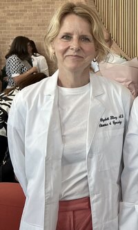 the-homestead-wedding-venue-rkm-photography-375 Laila looking out the window as she's putting her earrings in