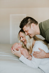 At-home newborn photography session in the Twin Cities, capturing the comfort and familiarity of your baby’s first days in a natural environment.