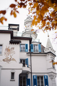 Historic Switzerland wedding venue on top of Lutzern, Switzerland with blue shutters.