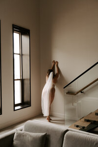 An intimate and beautiful bridal boudoir pose on location with Sharlie Faye Photogrpahy