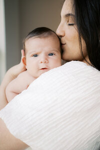 Toddler Smiling during Golden Hour by Austin Newborn Photographer