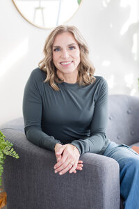 Woman smiling while organizing home supplies