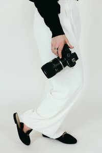 wedding photographer branding photos in a studio