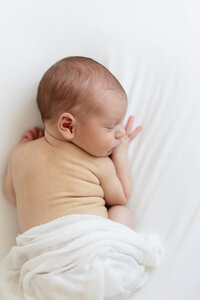 Baby sleeping at Boise newborn photograhy studio.