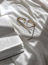 Reading Glasses & Book in the Sunlight