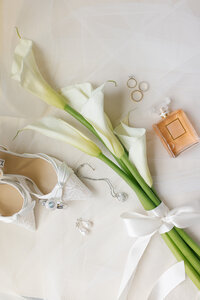 Black tie wedding tablescape with gold chargers