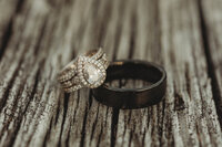 Wedding rings sitting on a wooden porch, close-up, in Blacksburg, Virginia.