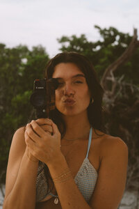 Girl with a super 8mm camera