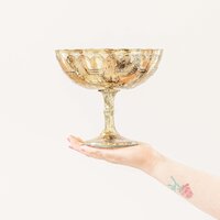 a gold flower vase