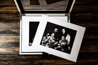 Luxury Portraits by Moving Mountains Photography in NC - Photo of black and white photos in a luxury custom album