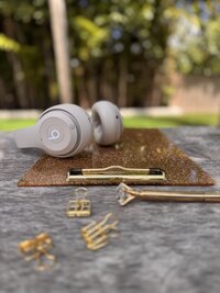 beats headphones on top of a clip board