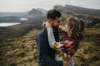 Couple posing on top of The Quiraing on Isle of Skye, Scotland!