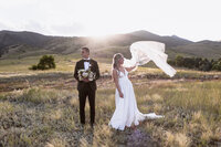 couple dances on sand dunes