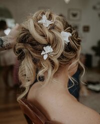 Beautiful up-style with flowers in the hair