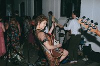 Wedding band with alternative vibes playing during a wedding reception at Dye House. Photography by Rhode Tripper Photography