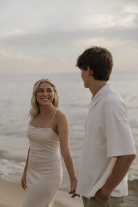 couples engagement photos on the beach