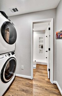 Washer and dryer in laundry room of this 2-bedroom, 2-bathroom bungalow outside Waco, TX