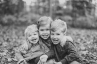 Three children laughing