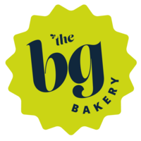 The BG Bakery in a scalloped, chartreuse circle and the bg bakery is navy