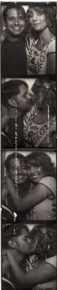 a black and white film strip of a couple in a photo booth