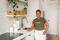 Michelle posing in a beautiful kitchen space