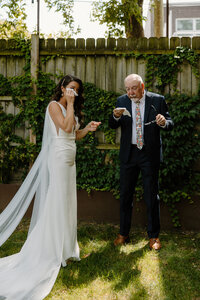 groom kissing brides cheek