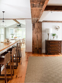 Hingham home over 200 years old, preserving fireplaces, posts, and beams while adding contemporary furnishings and design updates. 