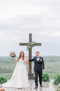 Bride and groom walk up memorial steps at their DC wedding