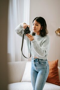 Photographer holding camera