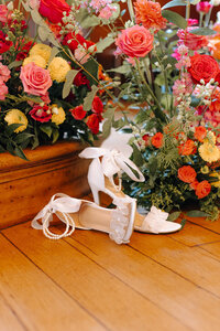 Elegant wedding decor at Salt House featuring wedding heels and floral arrangements