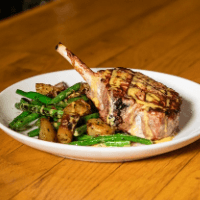 berkshire pork chop with white balsamic dijon sauce Stanwood Grill Restaurant