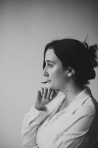 Black and white profile headshot of Amy