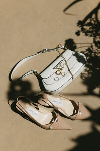 wedding flat lay with invite and  flowers