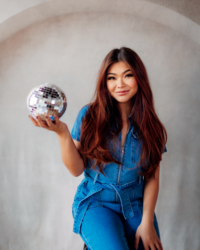 Kemotion business owner smiling in headshot, ready to start your website with tailored design for service brands.