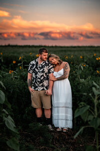 engagement session in a sunflower field in upstate ny