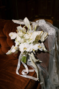 A birds eye view of a floral centerpiece and table setting at a destination wedding