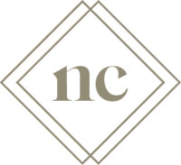 A logo with the letters N C and two diamonds