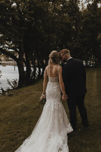 Couple hugging at wedding at Celebrations on the River in La Crosse, Wisconsin