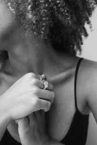 Woman reaching out hand to partner signifying relationship growth