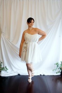 Belted short strapless tulle wedding dress