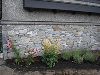 stone veneer under stucco