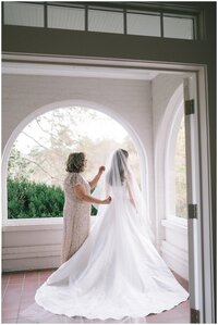 Sacramento Wedding Photographer captures bride and groom touching foreheads after beach wedding