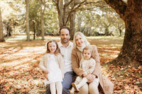 Kate and her husband and her two children during their family photoshoot  with auckland photographer michelle kelly