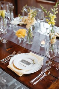 gray, yellow, and white wedding centerpieces