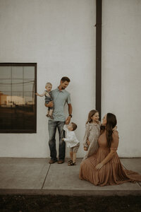 A family of 5 hangs out downtown while I take photos of them naturally interacting.