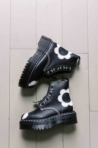 black combat boots on floor